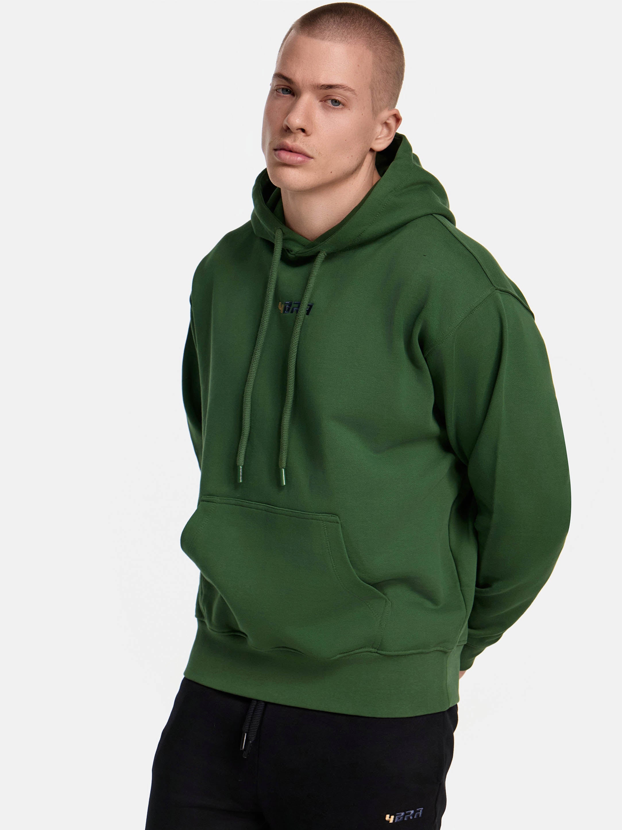Premium hoodie in gruen ansicht von der seite